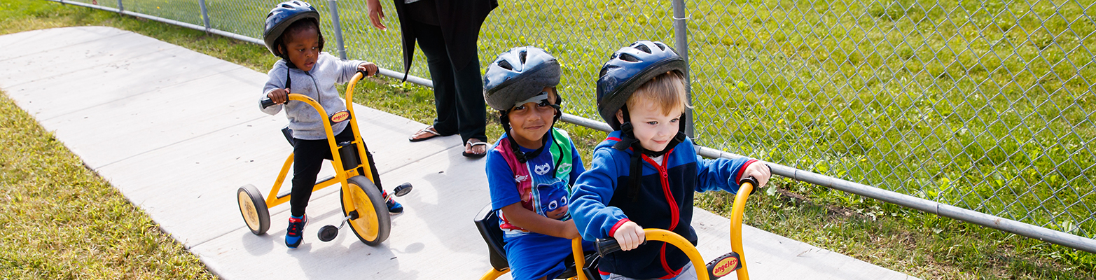 Children riding tricycles