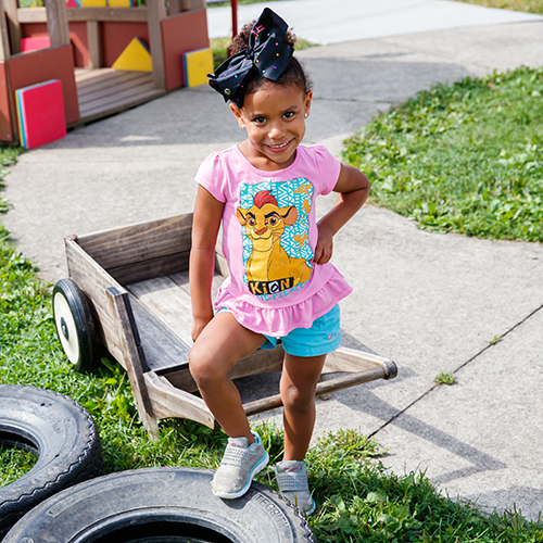 Child smiling on the playground