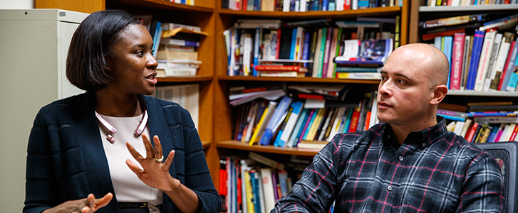Professor talking with student