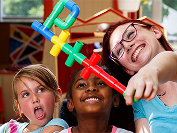 teacher with children in a classroom