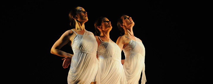 Dancers in white dresses