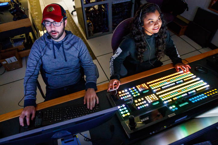 Students working with media equipment