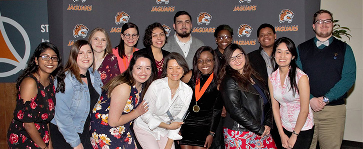 Honors College members posing for a photo at banquet