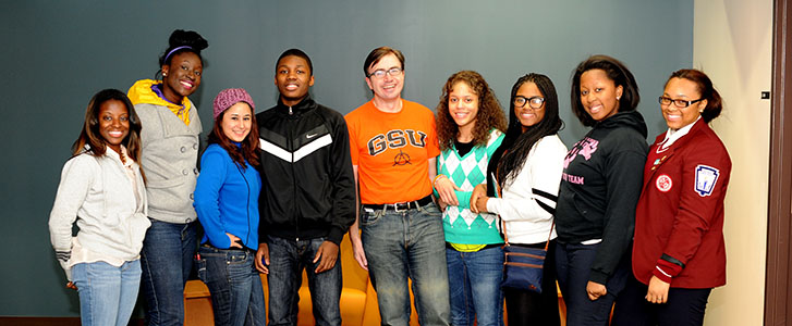Students and Dr. Rhea posing for picture in recreation area