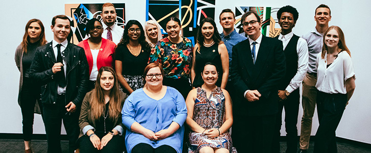 Honors College members posing for a photo at pinning ceremony