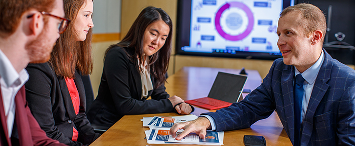 Professor showing students data Professor showing students data