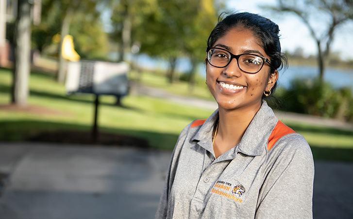 Student standing outside of campus