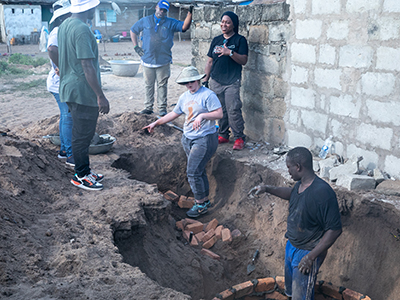 students digging a foundation in Ghana
