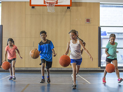 Elementary Kids Playing Basketball 