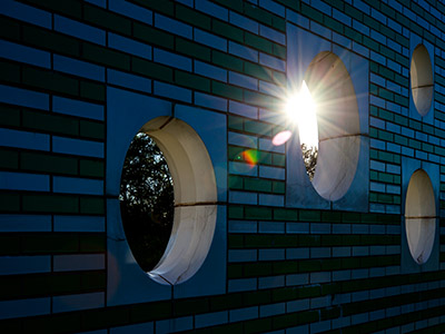 Sun through the holes in the sculpture