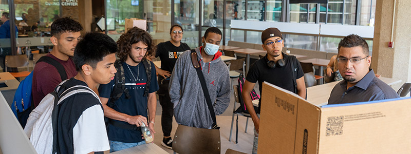 students looking at presentation