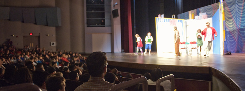 children attending perfomance at the Center