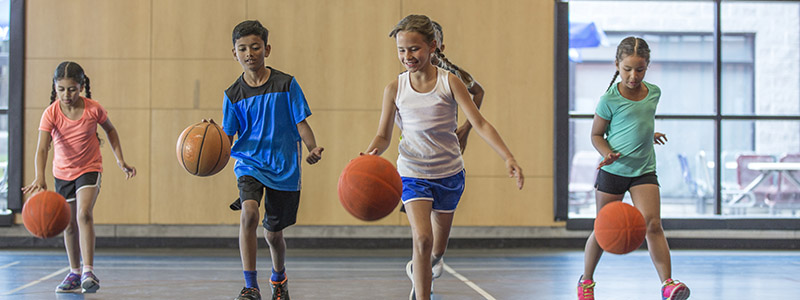 Elementary Kids Playing Basketball