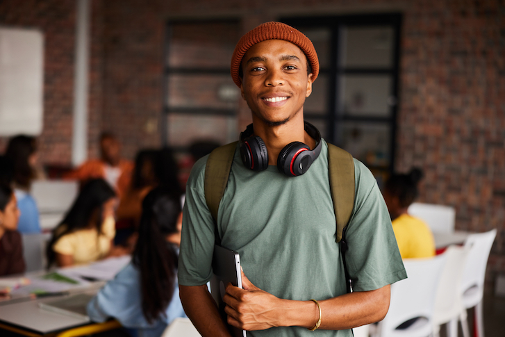 Student holding notebook