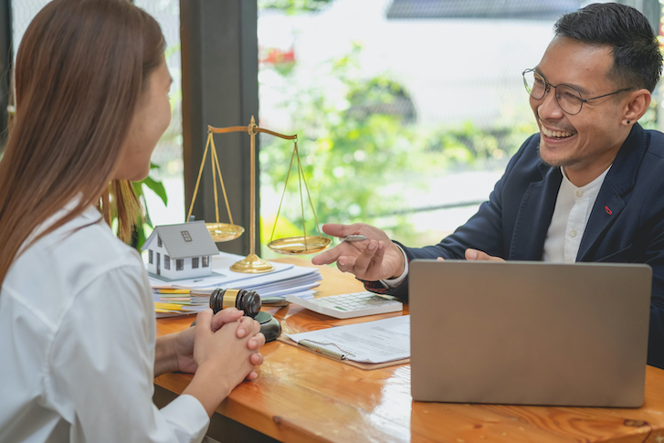 Legal Clinic staff member assisting client