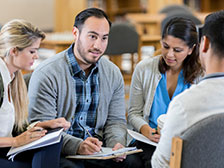 Tile-224x168-group-with-male-counselor-with-clipboard