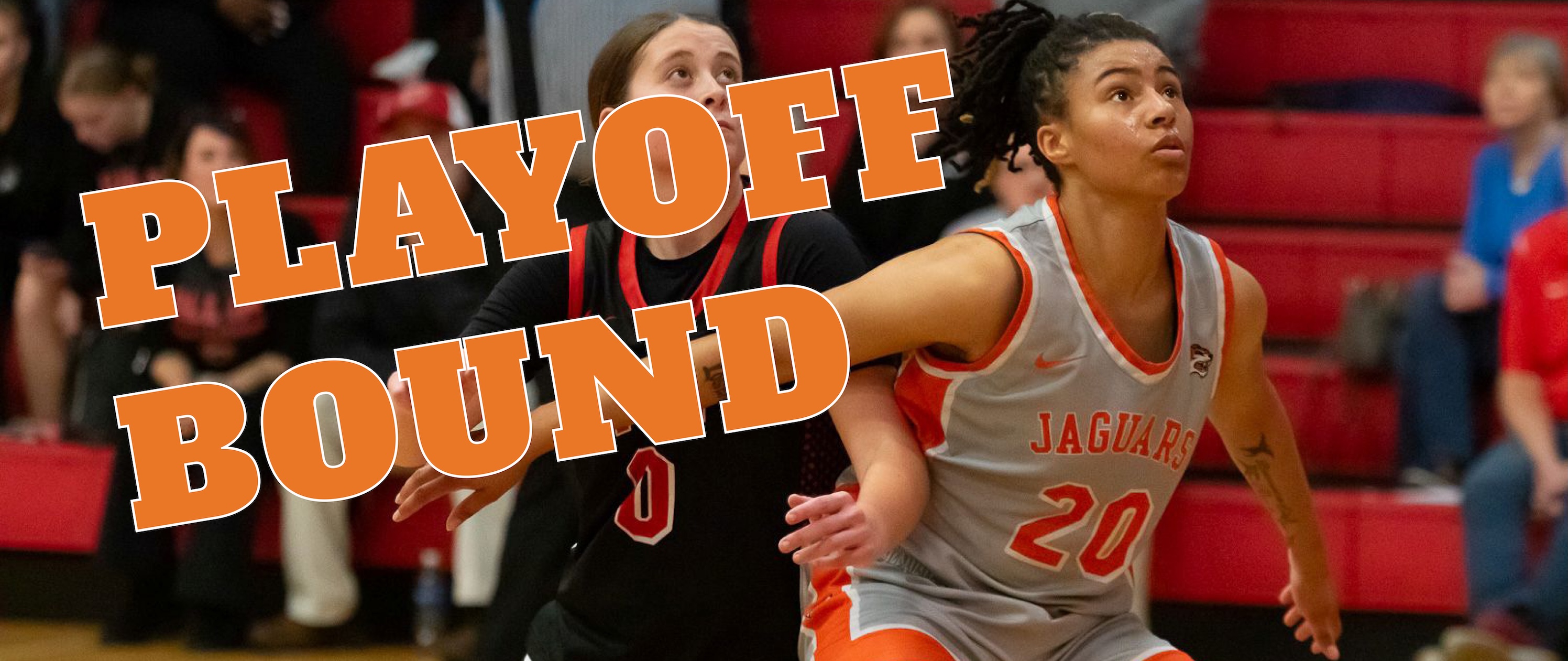 A group of women playing basketball
