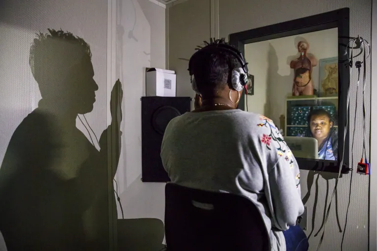 two women take part in a speech pathology test
