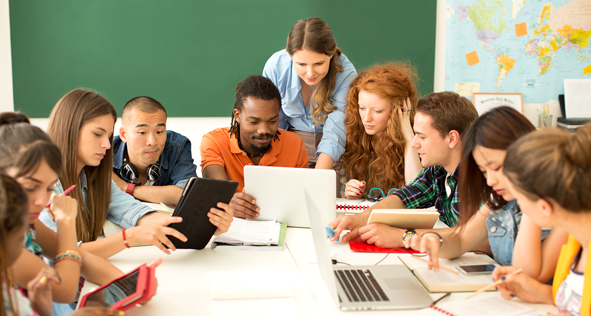 Several students working on task together