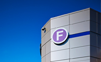 Sign on outside of the F Building