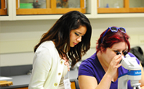 Two students working in science lab