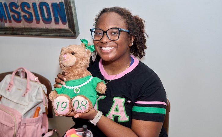 Person holding a teddy bear