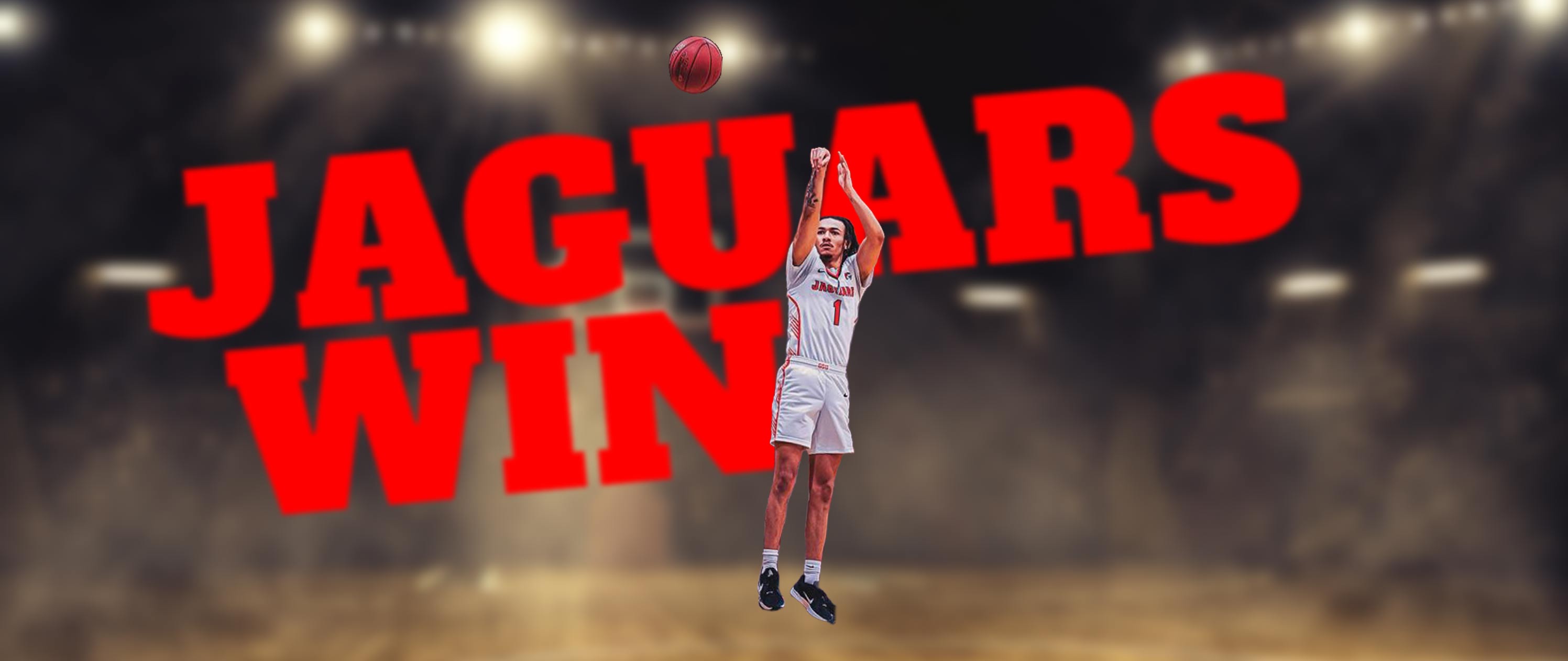 A person jumping in the air with a basketball